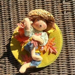 Annalee Paula in leaf pile 7" vintage discoloration as seen in pictures